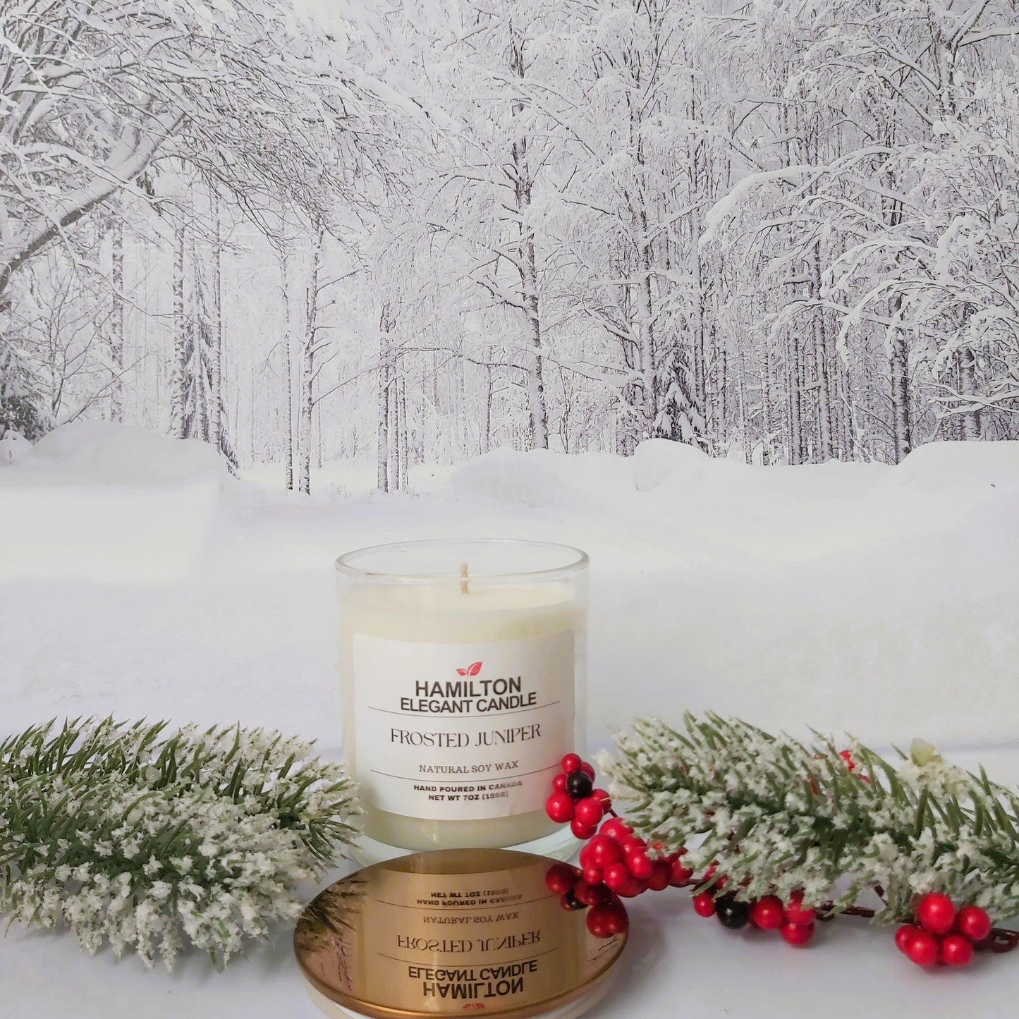Candle with packaging on a snowy forest background