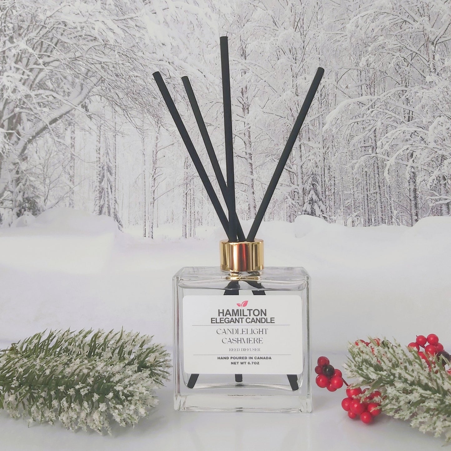 Diffuser with black sticks on a snowy landscape background