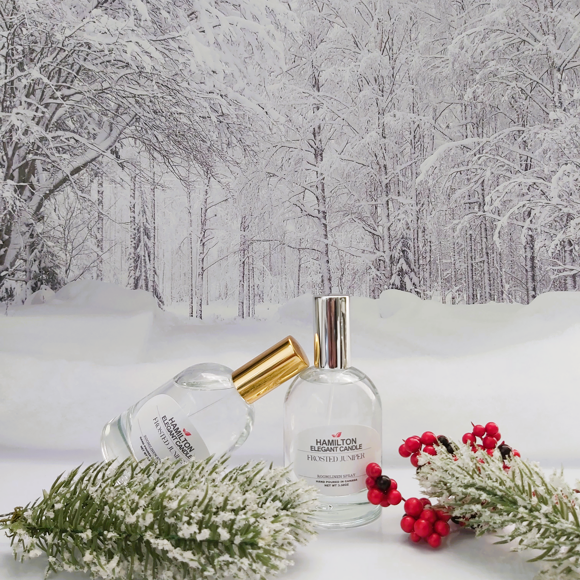 Two perfume bottles with floral decorations on a snowy landscape